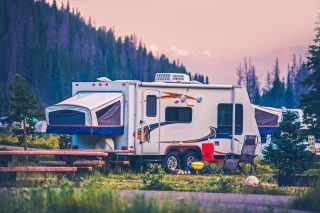 camper travel trailer in a valley